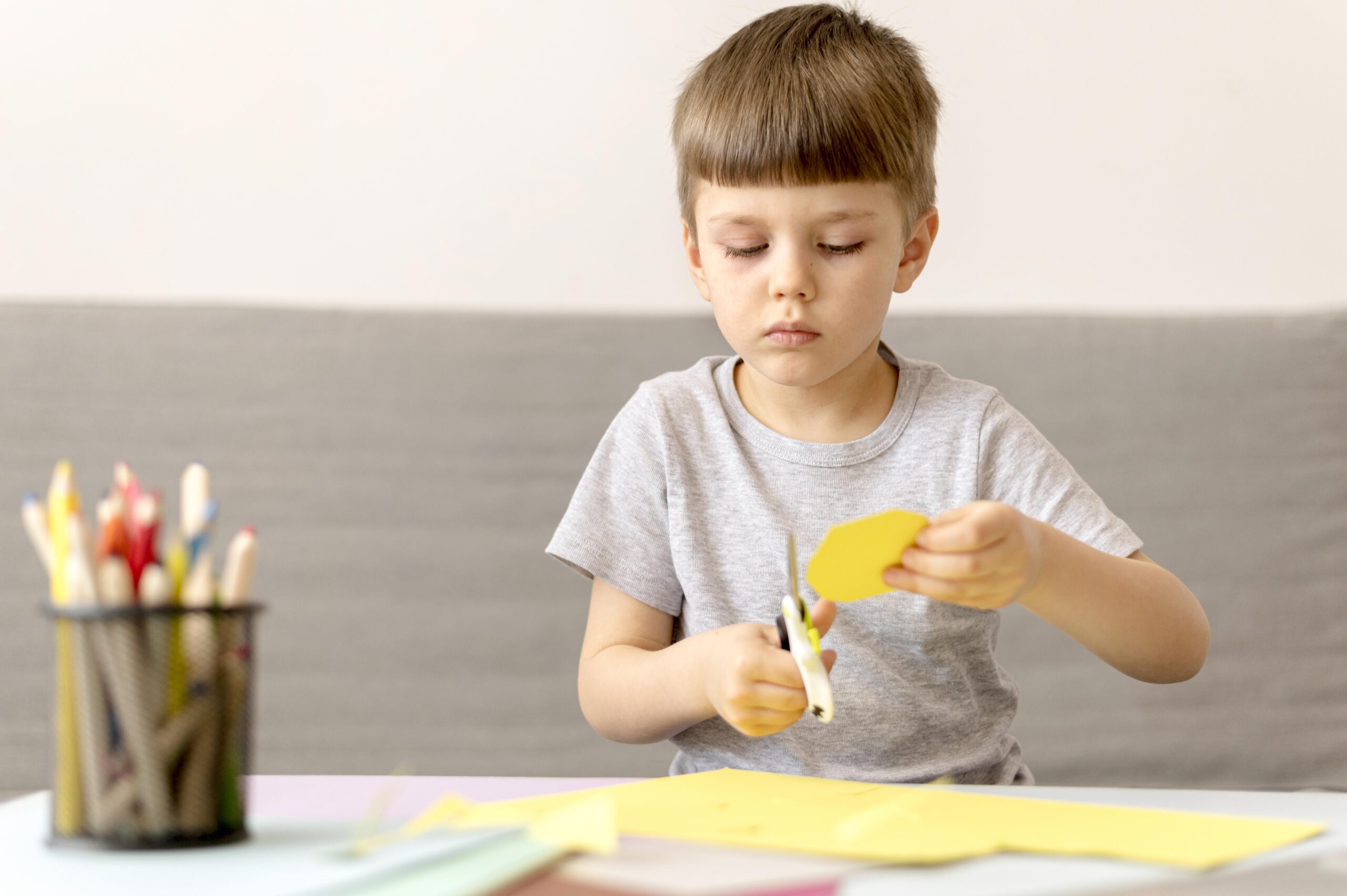 medium-shot-kid-cutting-paper