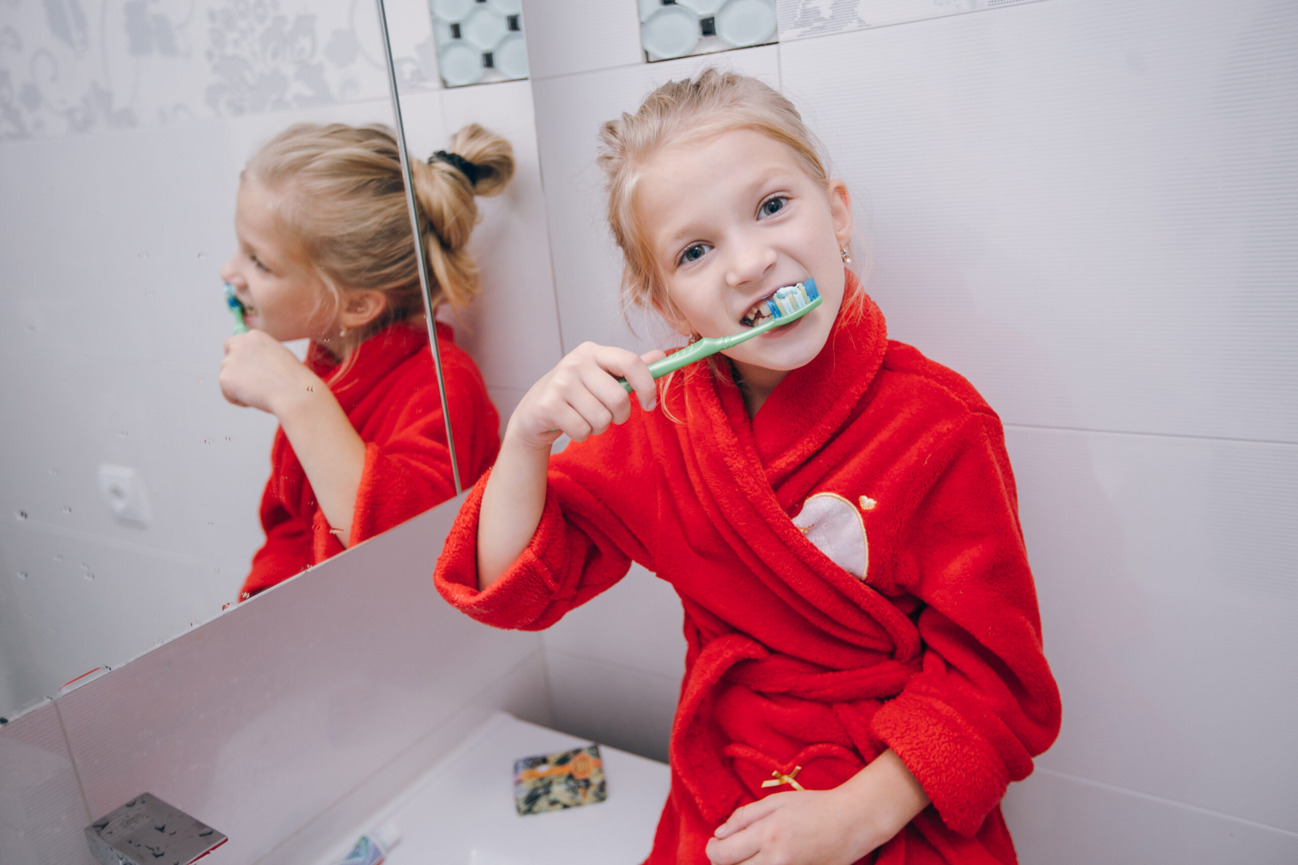 Woman in the morning in the bathroom doing morning procedures